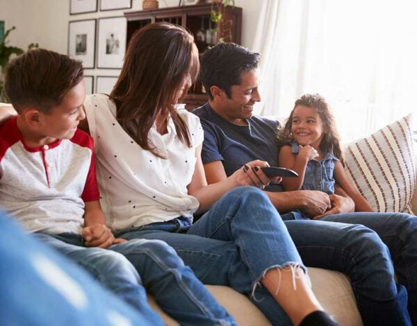 Family with Children on Couch - Millennial Parents Marketing Blog
