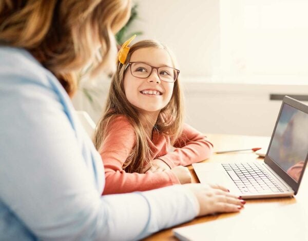 Parent and child on laptop - parents view on Education blog