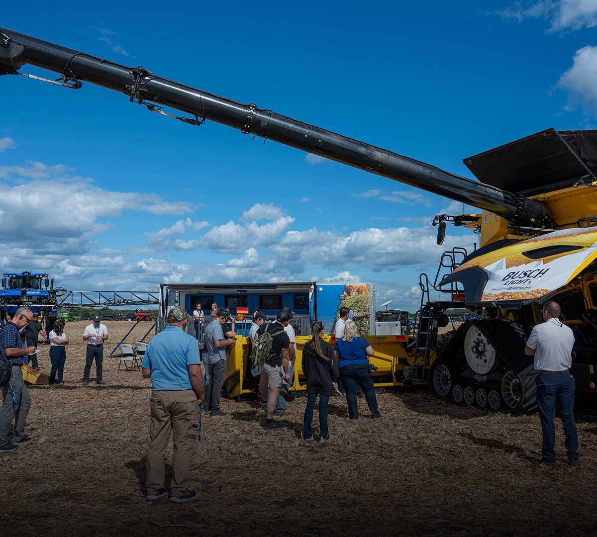 people viewing a twin rotor combine