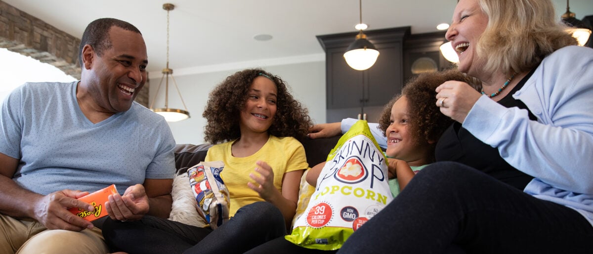 a group of people sitting on a couch