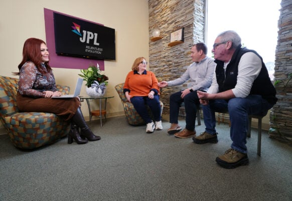 Lindsey Williams interviews Jill Sailer, Jon Bishop and Frank Rowland (left to right).