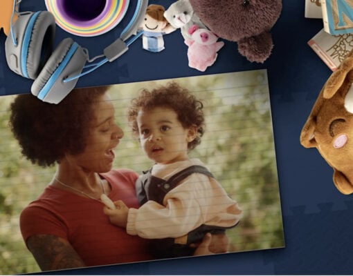 photo of a child in mother's arms