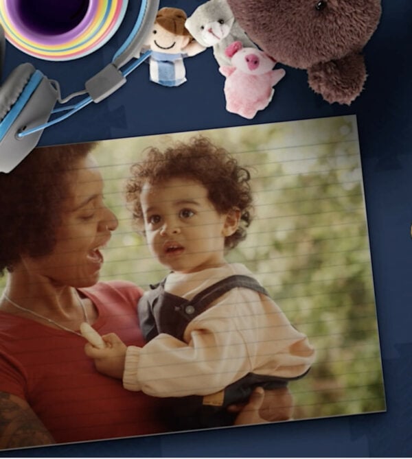 photo of a child in mother's arms