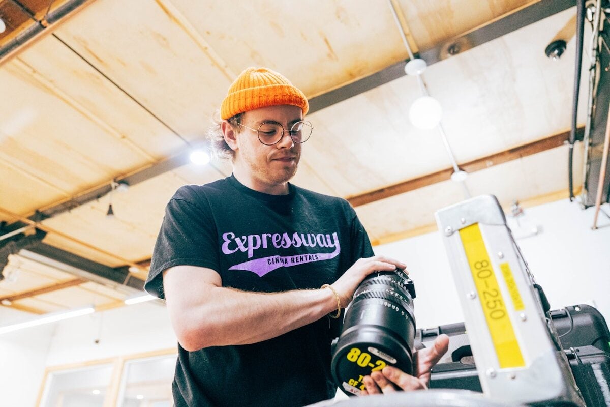 Expressway Cinema Rentals team member checking camera lens