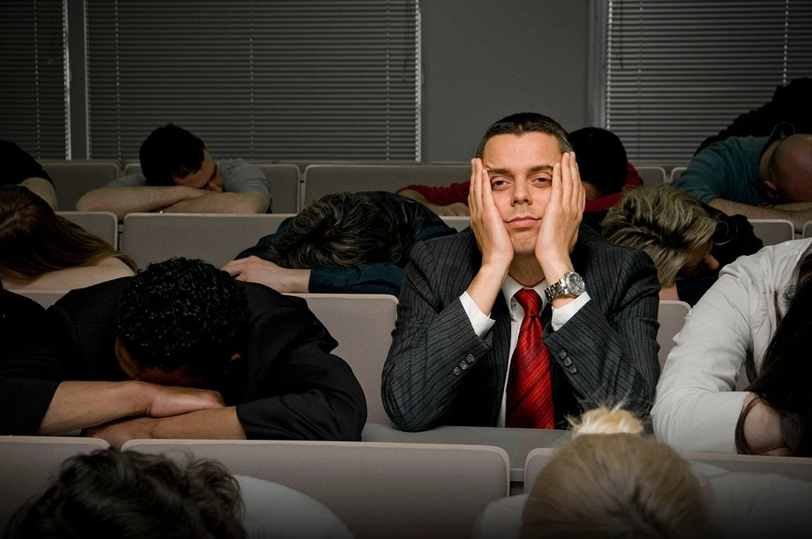 Bored business person listening to a presentation