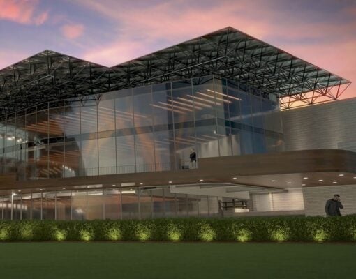Rendering of an office building with glass windows.